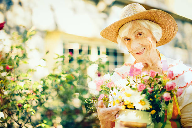 istock Senior woman gardening 490824227