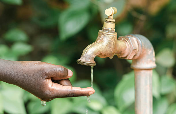 Finger Under Water Tap (Water Scarcity Symbol in Africa)