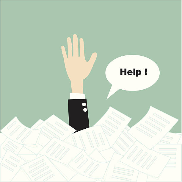 istock businessman need help under a lot of paper 490824405
