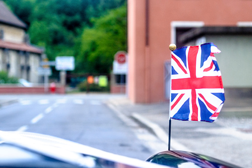 Close up on the british car flag while on the move