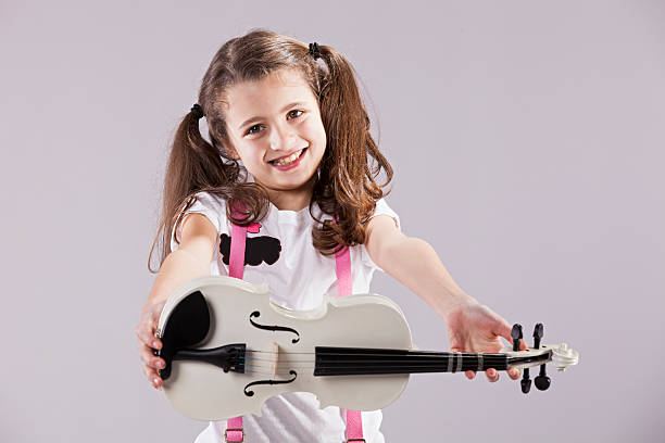 istock Female child playing the violin 490825981