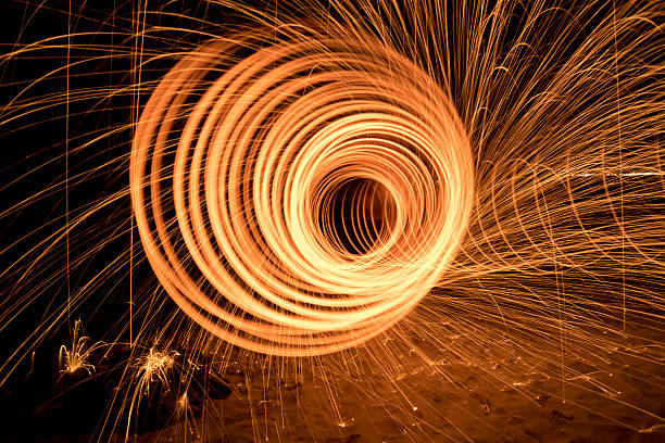 istock steel wool light painting tunnel at beach 490826436