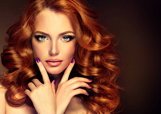 istock Girl model with long curly red hair. 490846016