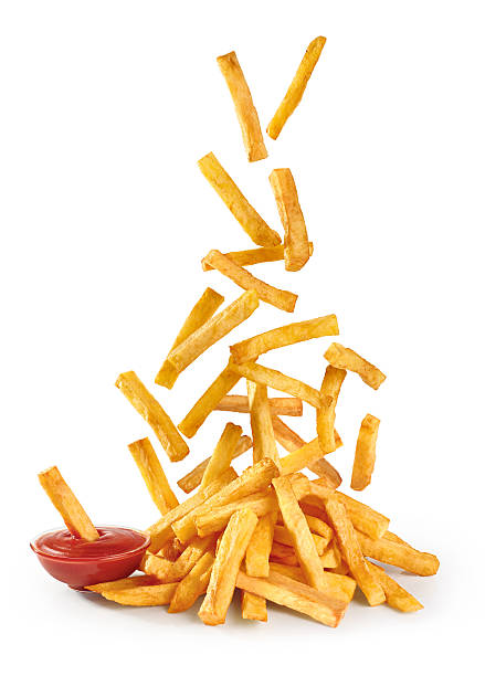 istock Flying fried potatoes and ketchup isolated on white background. 490846258