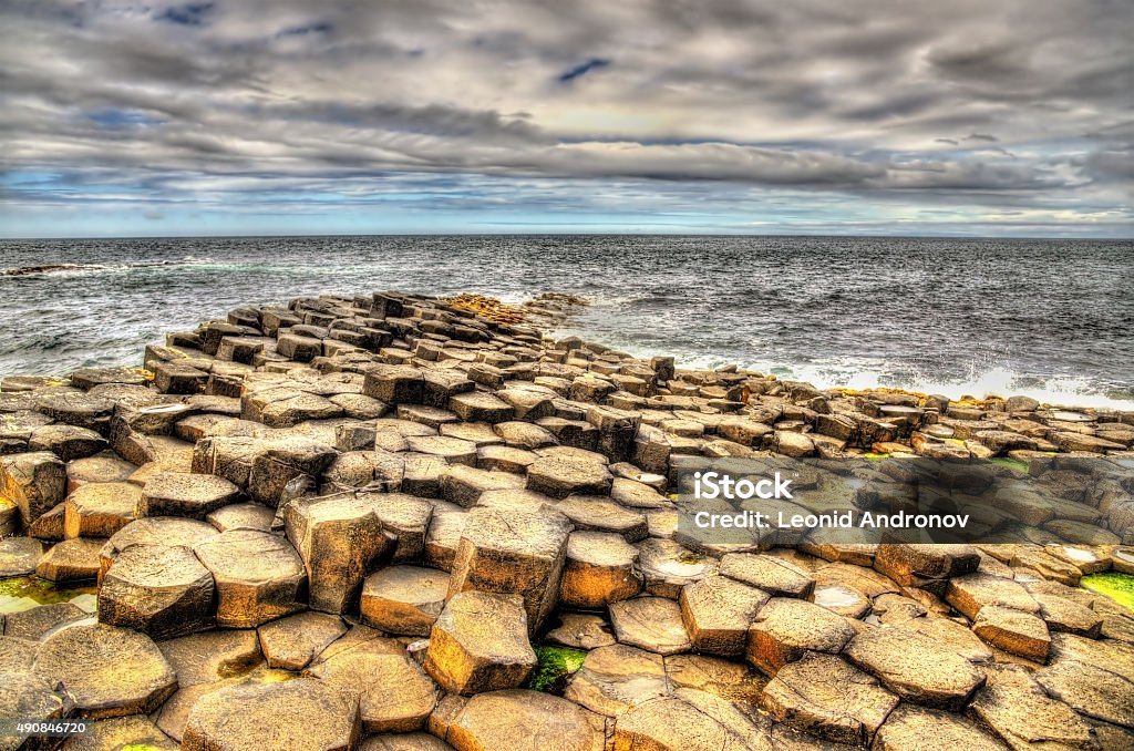 Basalt-tiled seashore of the Giant's Causeway - Northern Ireland Giants Causeway Stock Photo