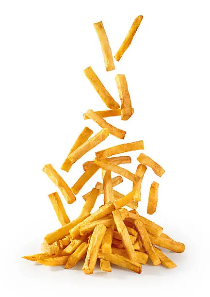 Fastfood. Flying fried potatoes isolated on white background. French fries.