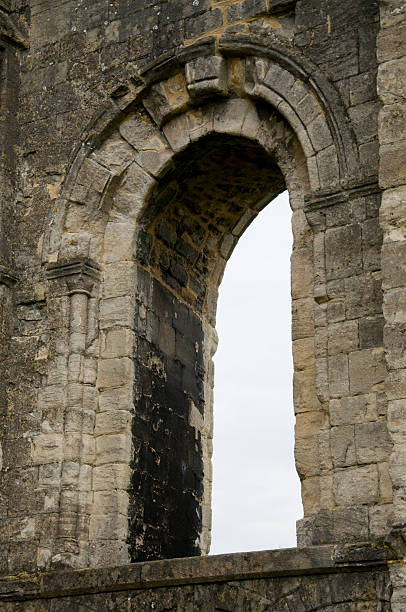 istock Malmesbury Abbey  Stone Arch Detail 490847907