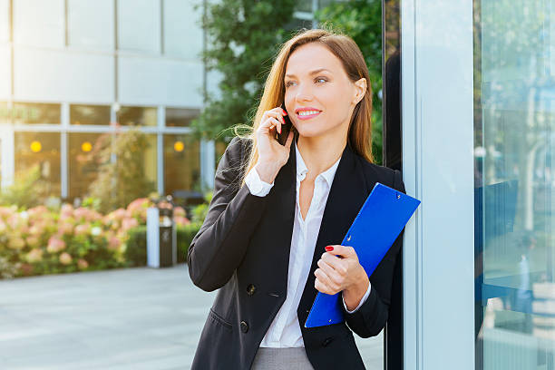 istock Businesswoman talking on mobile phone 490848738