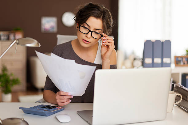 istock Young woman hard working at home 490848923