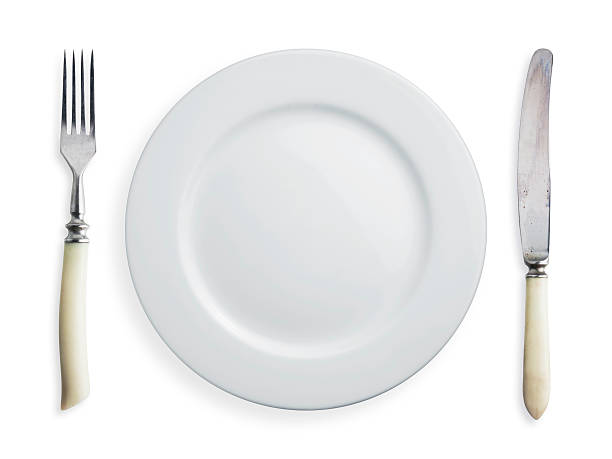 istock closeup of a place setting with dinner-plate 490849575