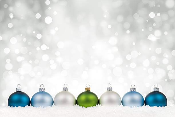 istock Multicolor clean baubles in line on  snow 490851030