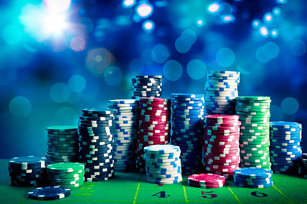 istock Casino chips with dramatic lighting and lens flares 490851303