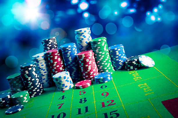 istock Casino chips with dramatic lighting and lens flares 490851305