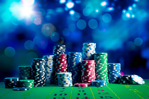 istock Casino chips with dramatic lighting and lens flares 490851307