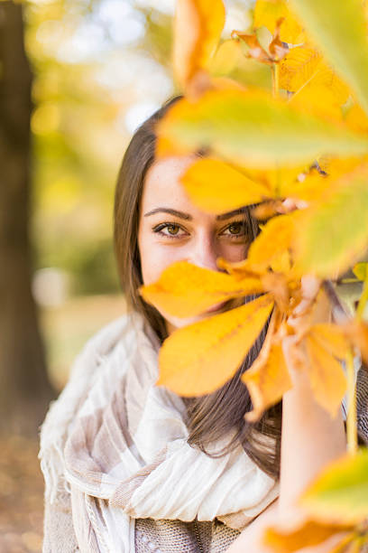 istock Young woman in autumn forest 490851682