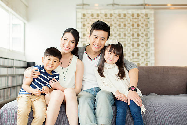 Young Chinese Family in Apartment