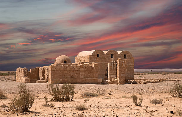 Quseir (Qasr) Amra desert castle near Amman, Jordan. Quseir (Qasr) Amra desert castle near Amman, Jordan. World heritage with famous fresco's. Built in 8th century by the Umayyad caliph Walid II, the castle is one of the most important examples of early Islamic art and architecture medieval fresco stock pictures, royalty-free photos & images