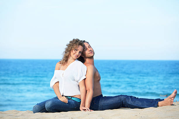 istock Young Couple On The Beach 490852285
