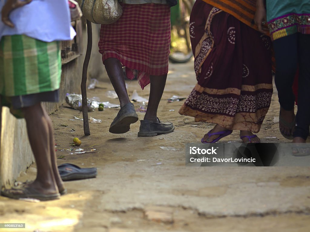 Kolkata legs Legs of Kolkata people walking on the street, India. Poverty Stock Photo