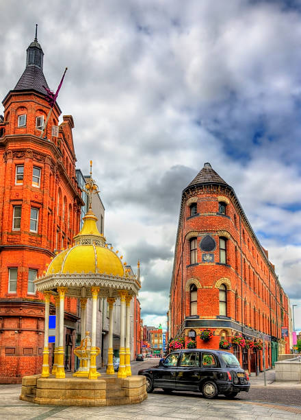 The Jaffe Memorial Fountain and Bittles Bar in Belfast The Jaffe Memorial Fountain and Bittles Bar in Belfast - Northern Ireland belfast stock pictures, royalty-free photos & images