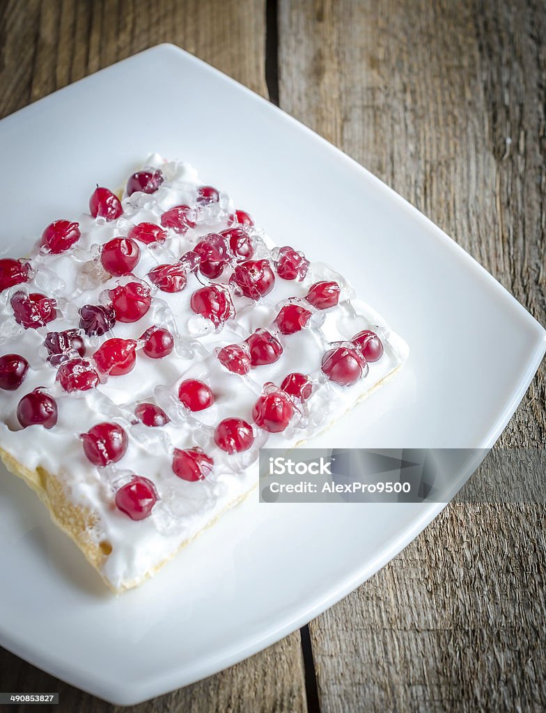 Tart with whipped cream and fresh cranberries Baked Stock Photo