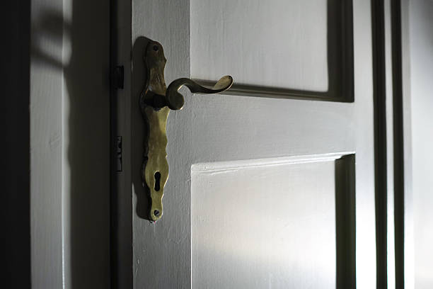 istock White Wood Door With Golden Door Handle 490854638