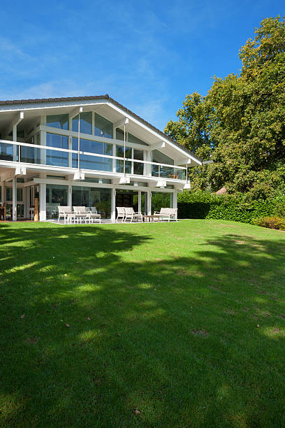 istock beautiful house with garden 490856000