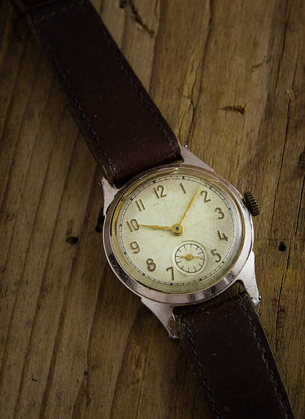 istock Vintage wristwatch on wood 490856198