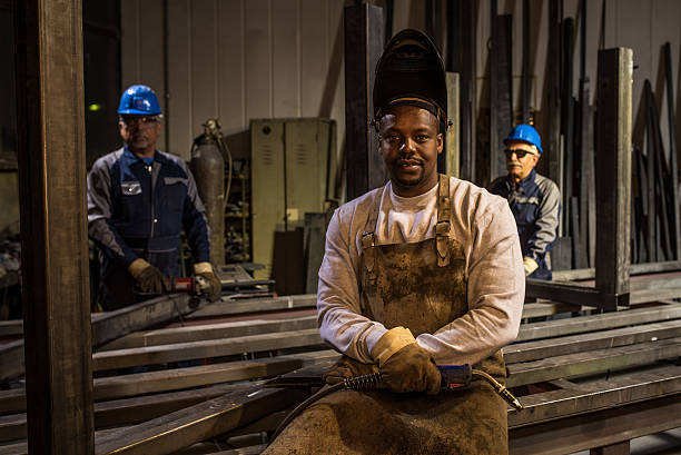 istock Portrait of welders in workshop 490857466