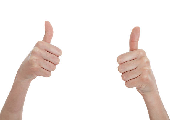 istock people holding their thumbs up 490859498