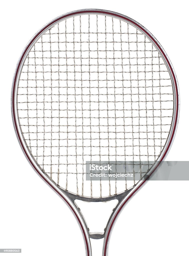 Old tennis racket isolated on white. Old metal tennis racket isolated on white background. Studio shot. Aluminum Stock Photo