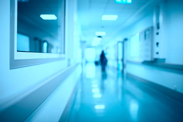 istock Blurred hospital corridor medical background 490880656