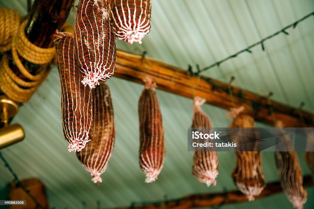 Drying Salami Salami from meat, left to dry from the ceiling Greece Stock Photo