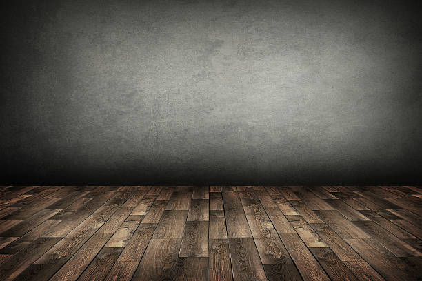 istock old room with concrete wall and wooden floor 490883052