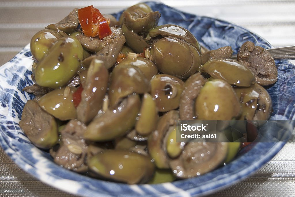 olives traditional Italian recipes: olives in oil with herbs Backgrounds Stock Photo