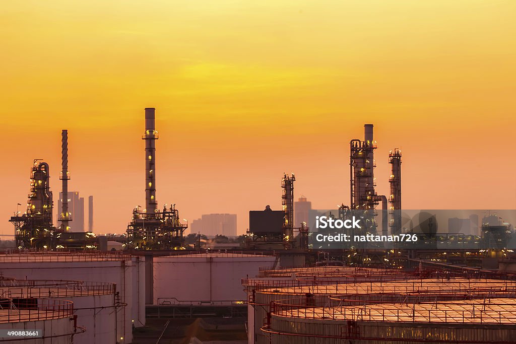 Oil refinery Refinery in the morning. Chimney Stock Photo