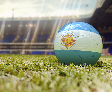 3D Soccer ball with the flag of Argentina in the middle of a stadium