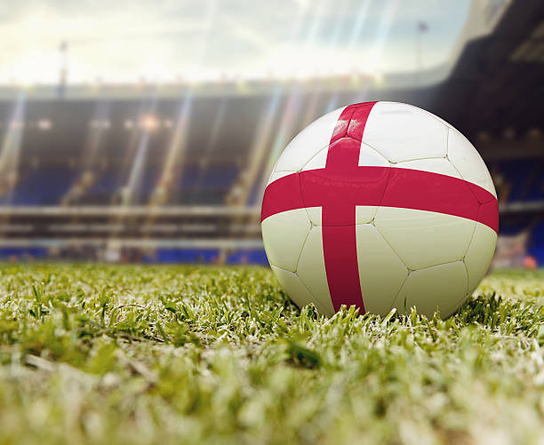 3D Soccer ball with the flag of England in the middle of a stadium