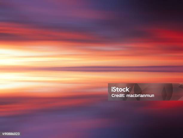 Reflection Of Colorful Clouds With Long Exposure Effect Motion Blurred Stock Photo - Download Image Now