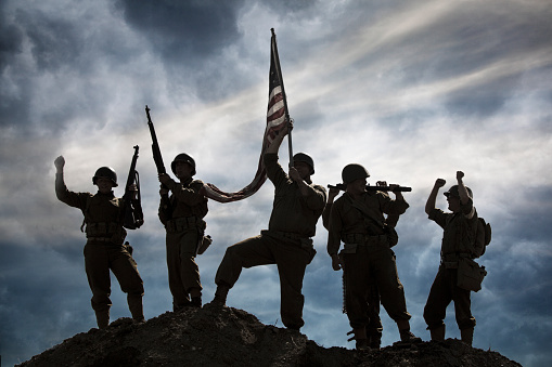 Military Victory, Soldiers take a hill and wave an American Flag