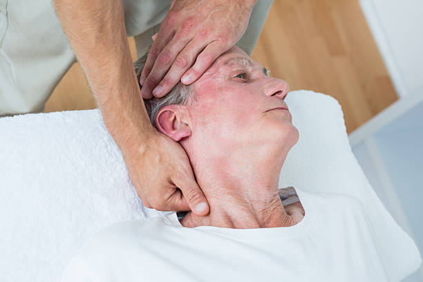istock Man receiving neck massage 490889722