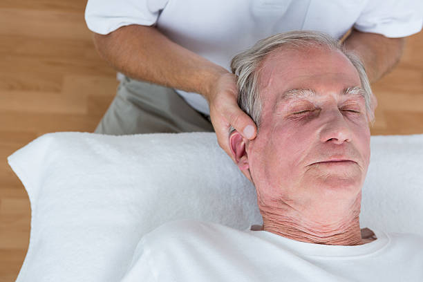 istock Man receiving neck massage 490890002
