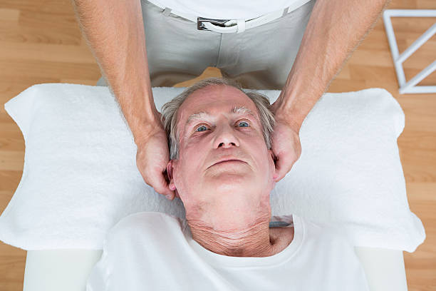 istock Man receiving neck massage 490890130