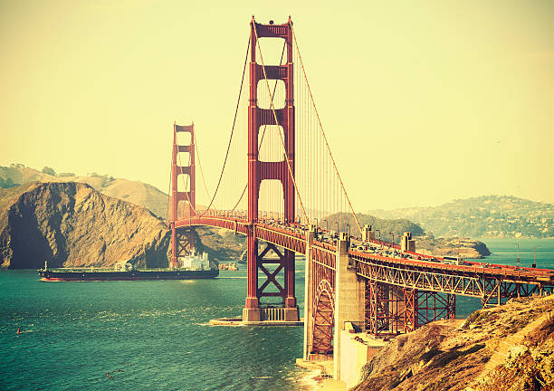 Old film retro style Golden Gate Bridge in San Francisco. stock photo