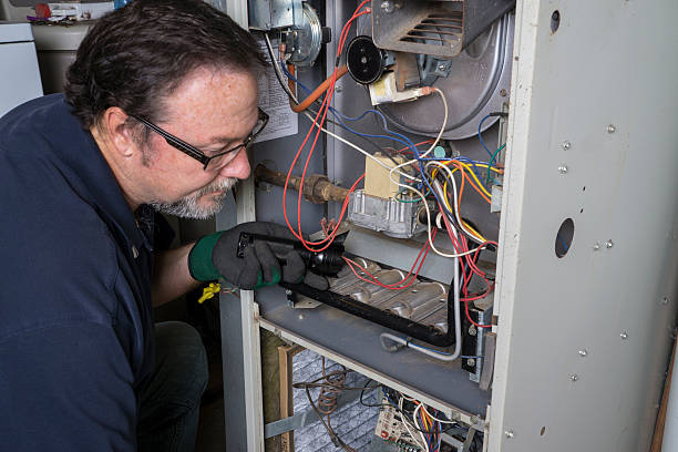 la recherche sur un technicien gaz furnace - entretien photos et images de collection