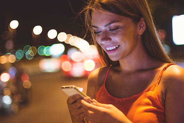istock Happy girl using her phone 490909504