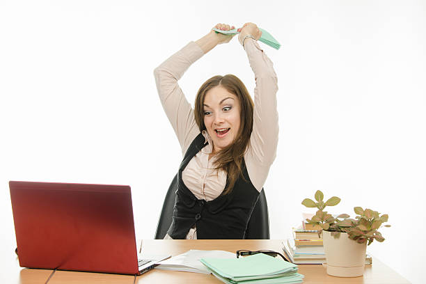 istock The teacher has a book on a laptop 490909570