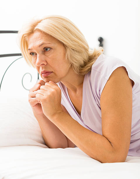 istock unhappy mature woman 490910232