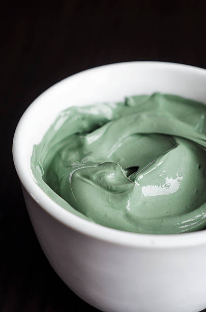 istock Green cosmetic clay in a bowl 490911902