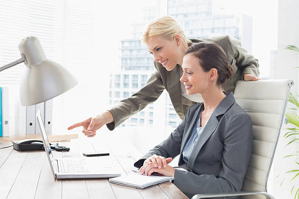 istock Businesswomen working together 490913878